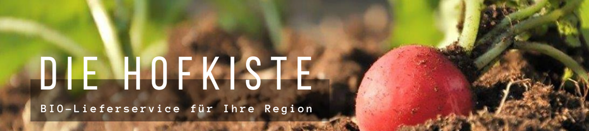 Ein frisches Radieschen in lockerer Erde – regional, biologisch und direkt vom Blumenhof: Ihr Bio-Lieferservice Die Hofkiste