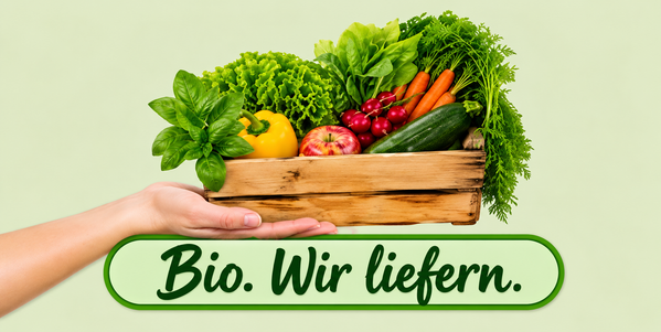 Bio-Gemüsekiste der Hofkiste mit frischem Gemüse und dem Schriftzug „Bio. Wir liefern.“